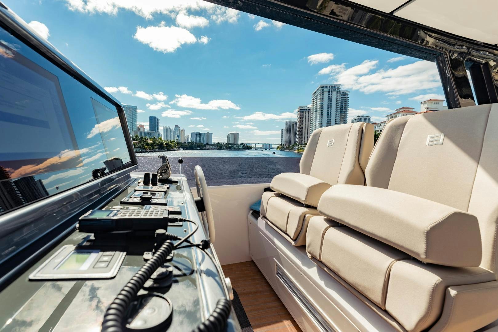 a car with a view of a city and water aboard BESO Yacht for Sale