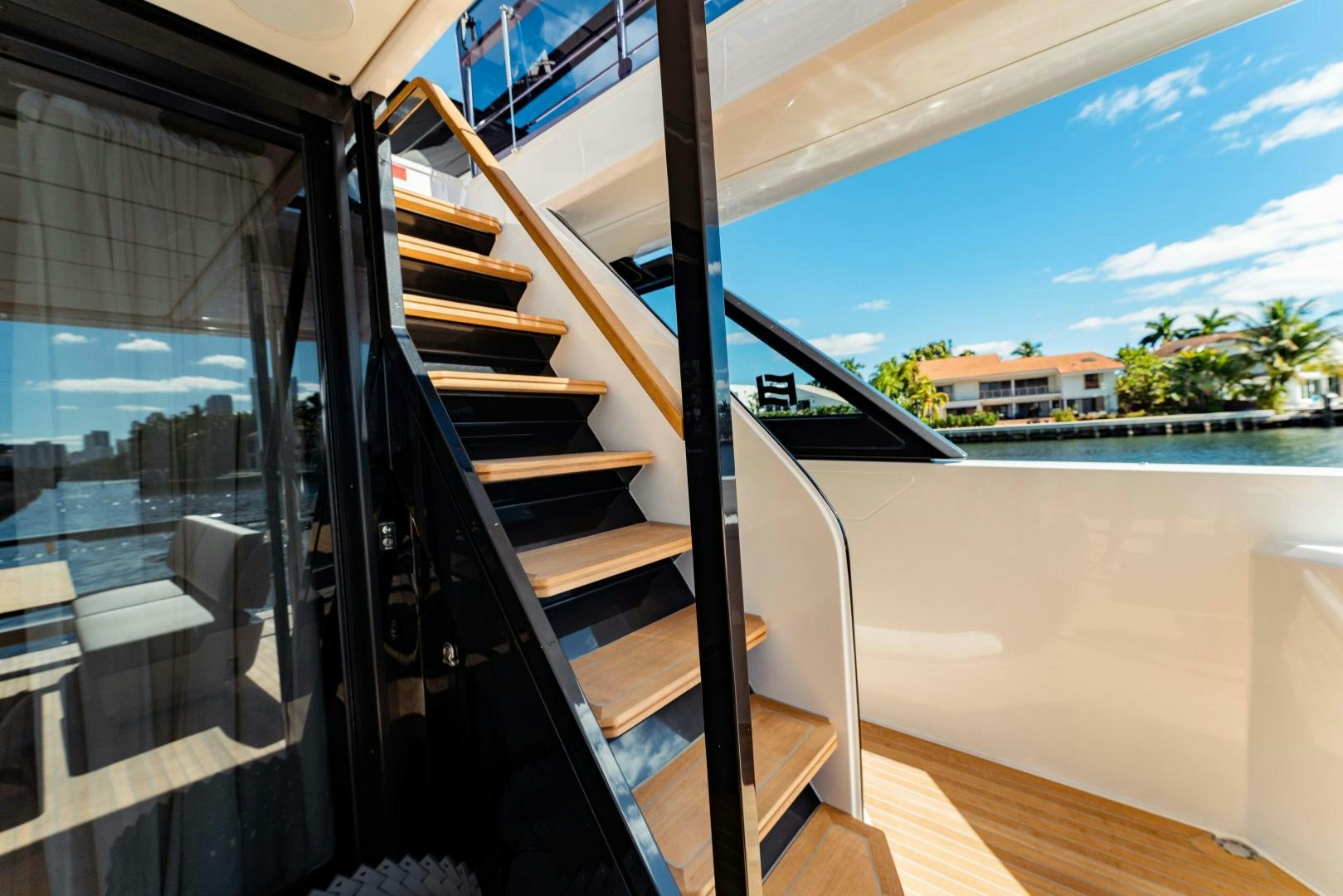 a set of stairs leading to a balcony aboard BESO Yacht for Sale