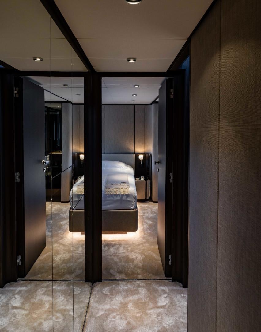 a hallway with a bed aboard BESO Yacht for Sale