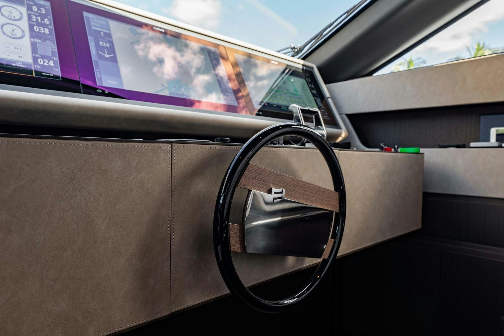 a car with a side mirror aboard BESO Yacht for Sale