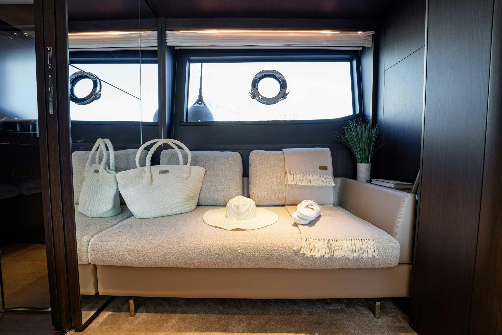 a bed with pillows and a pillow aboard BESO Yacht for Sale