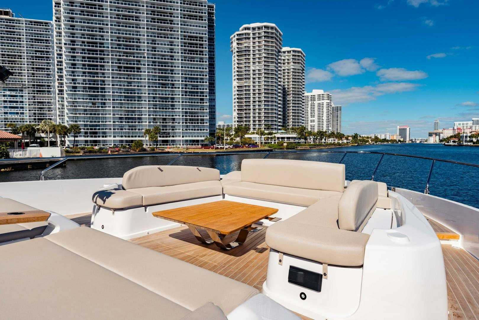 a room with a view of a city and a body of water aboard BESO Yacht for Sale