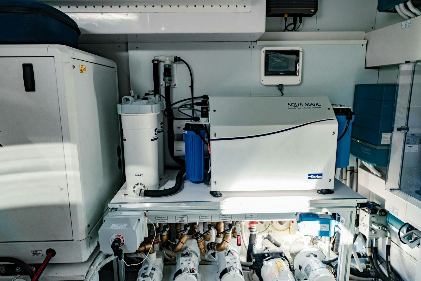 a machine with a monitor and other objects on it aboard BESO Yacht for Sale