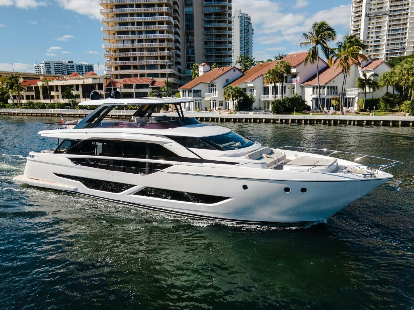 a white yacht on the water aboard BESO Yacht for Sale