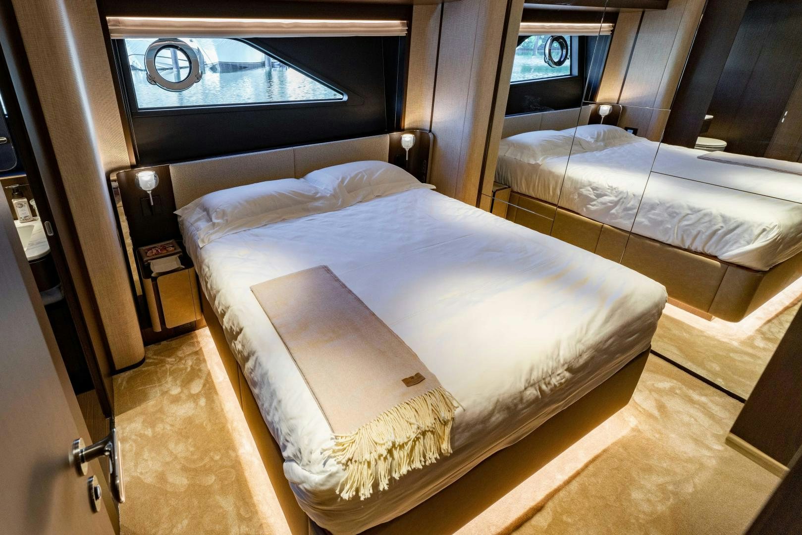 a room with two beds aboard BESO Yacht for Sale