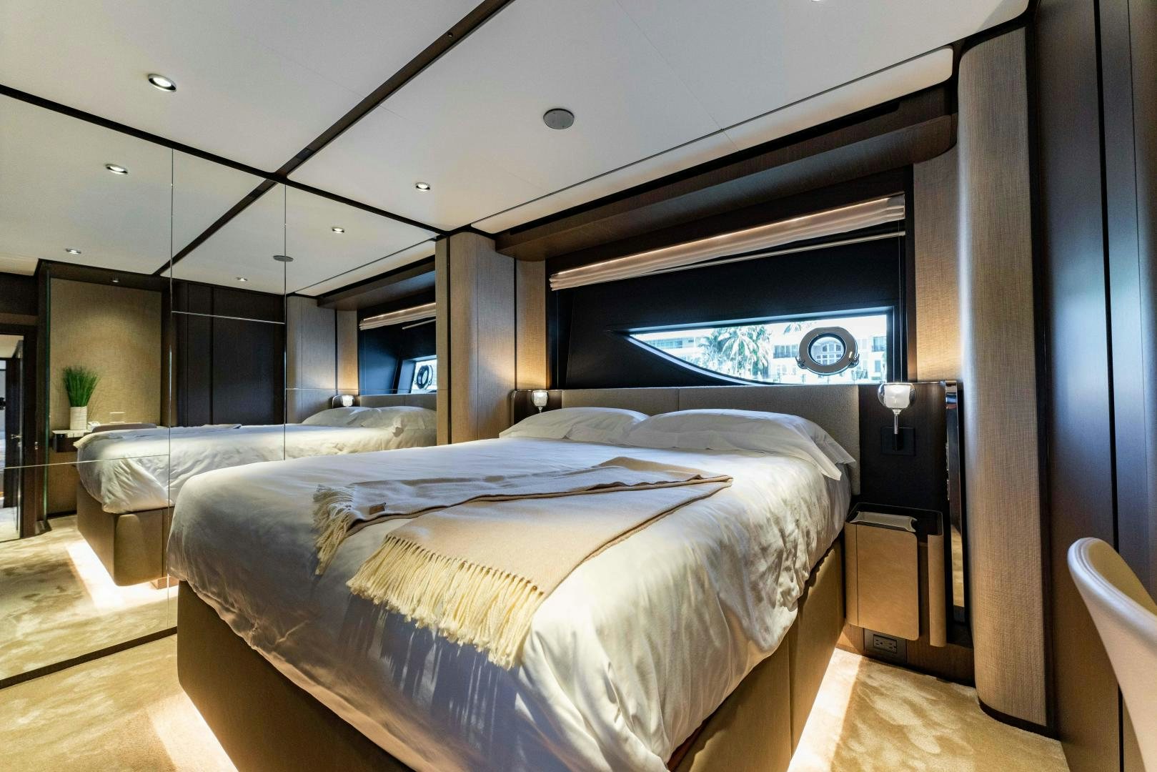 a room with two beds aboard BESO Yacht for Sale