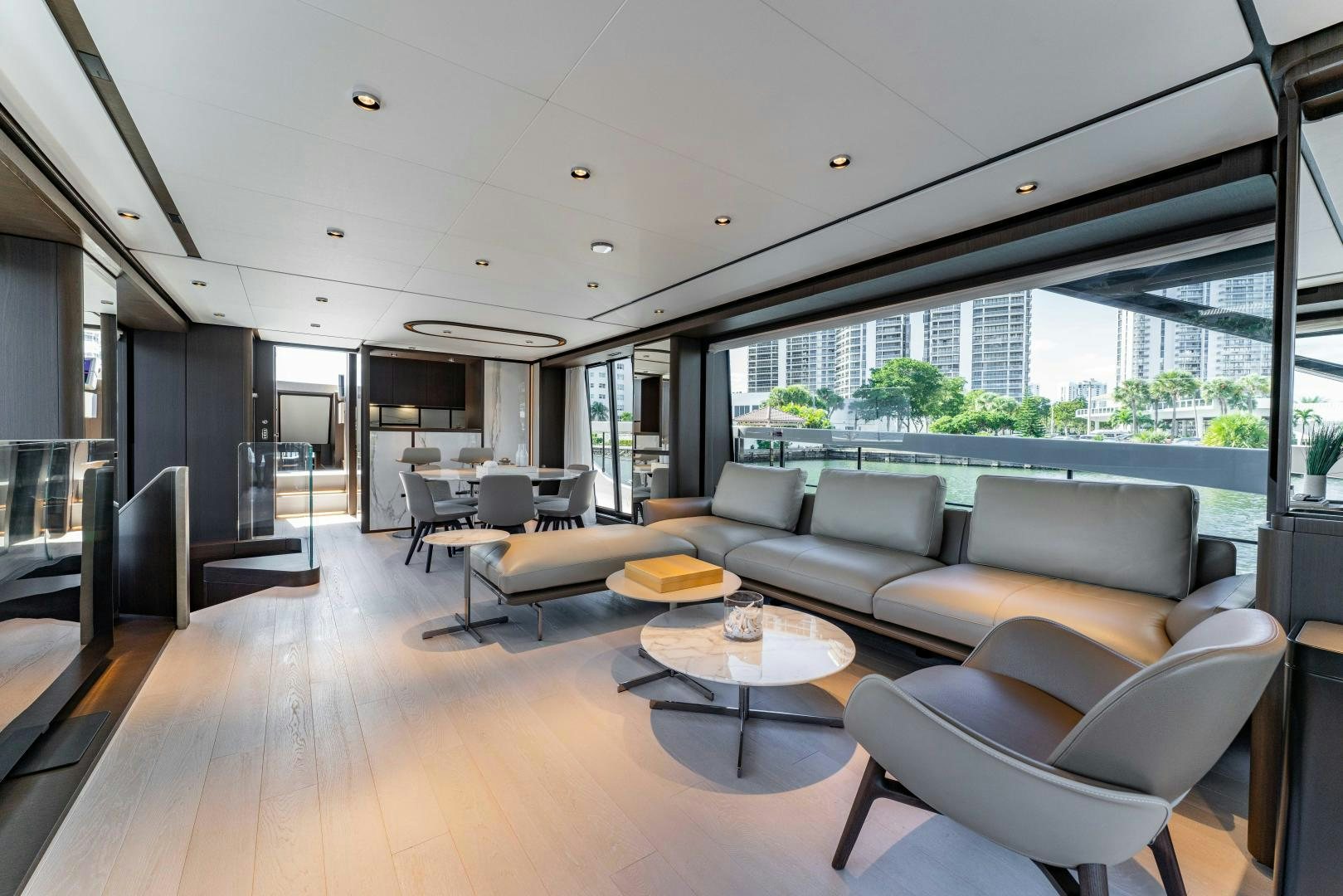 a living room with a large window aboard BESO Yacht for Sale