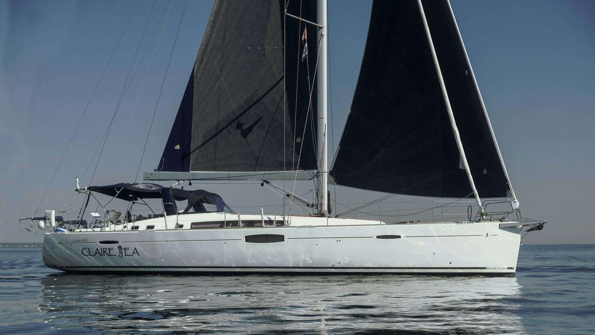 a white boat on the water aboard CLAIRE SEA Yacht for Sale