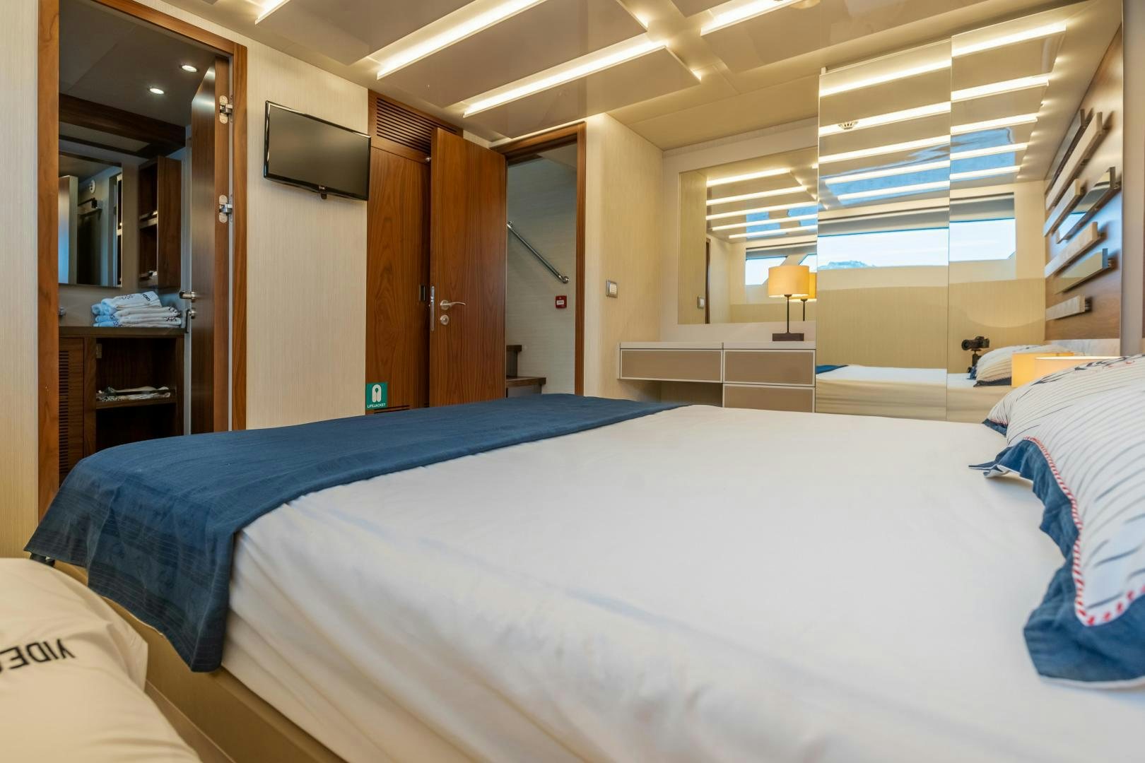 a bed in a room aboard VICTORY Yacht for Sale