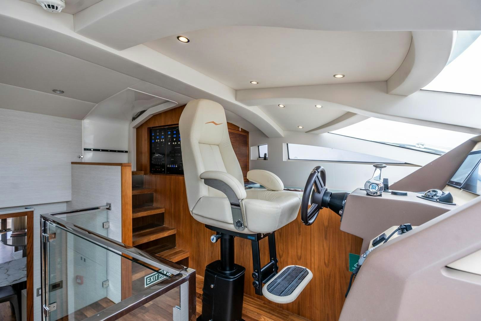 a room with a desk and chairs aboard VICTORY Yacht for Sale
