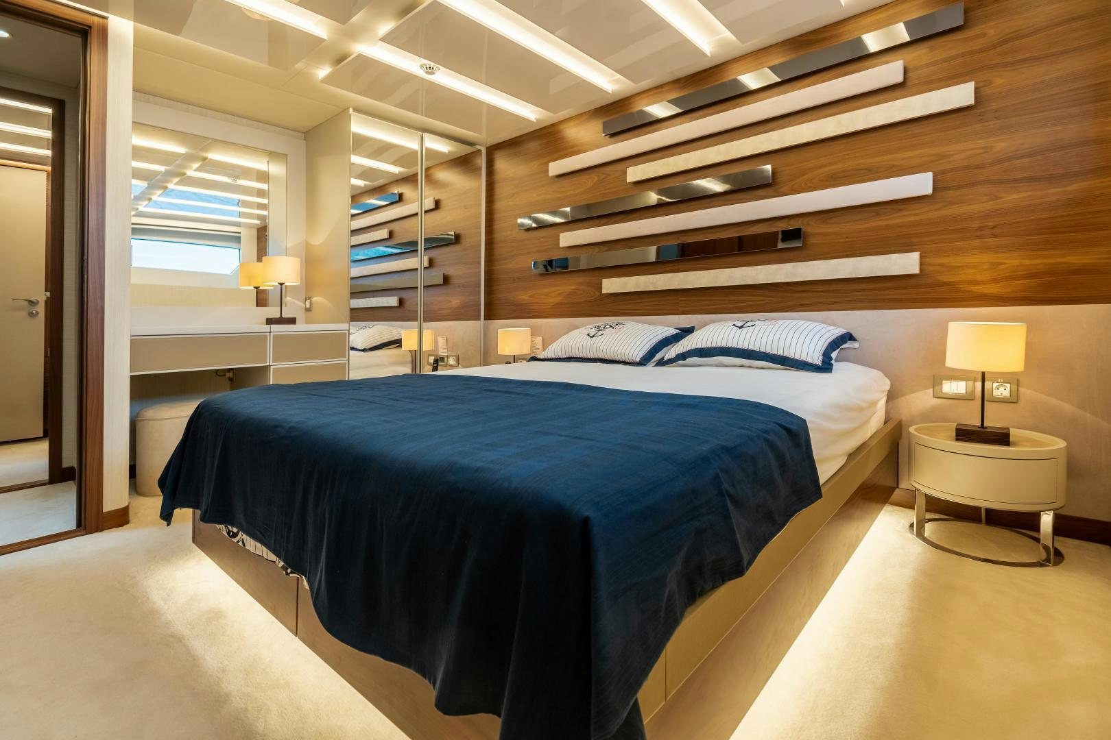 a large bed in a room aboard VICTORY Yacht for Sale