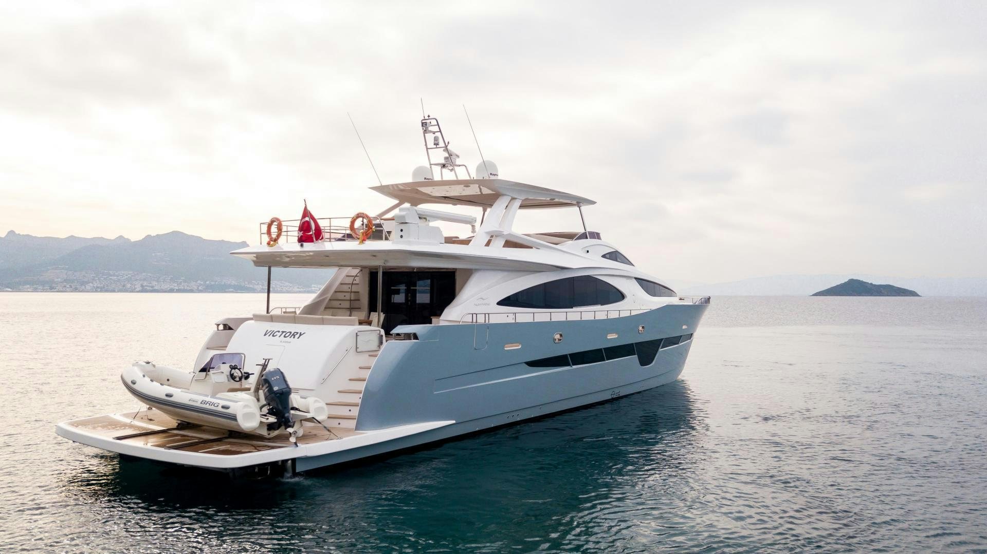 a white yacht in the water aboard VICTORY Yacht for Sale
