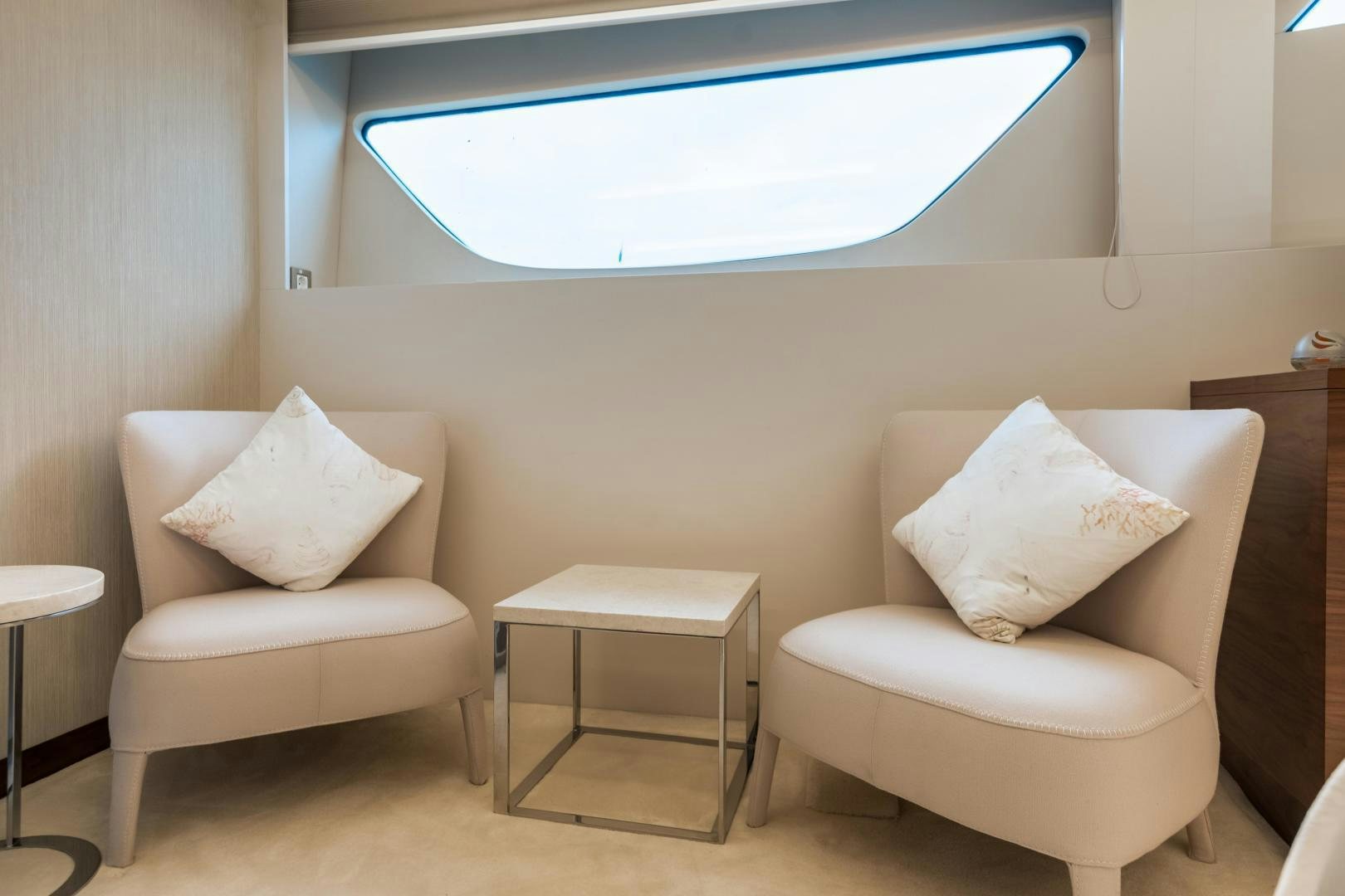 a room with a couch and a table aboard VICTORY Yacht for Sale