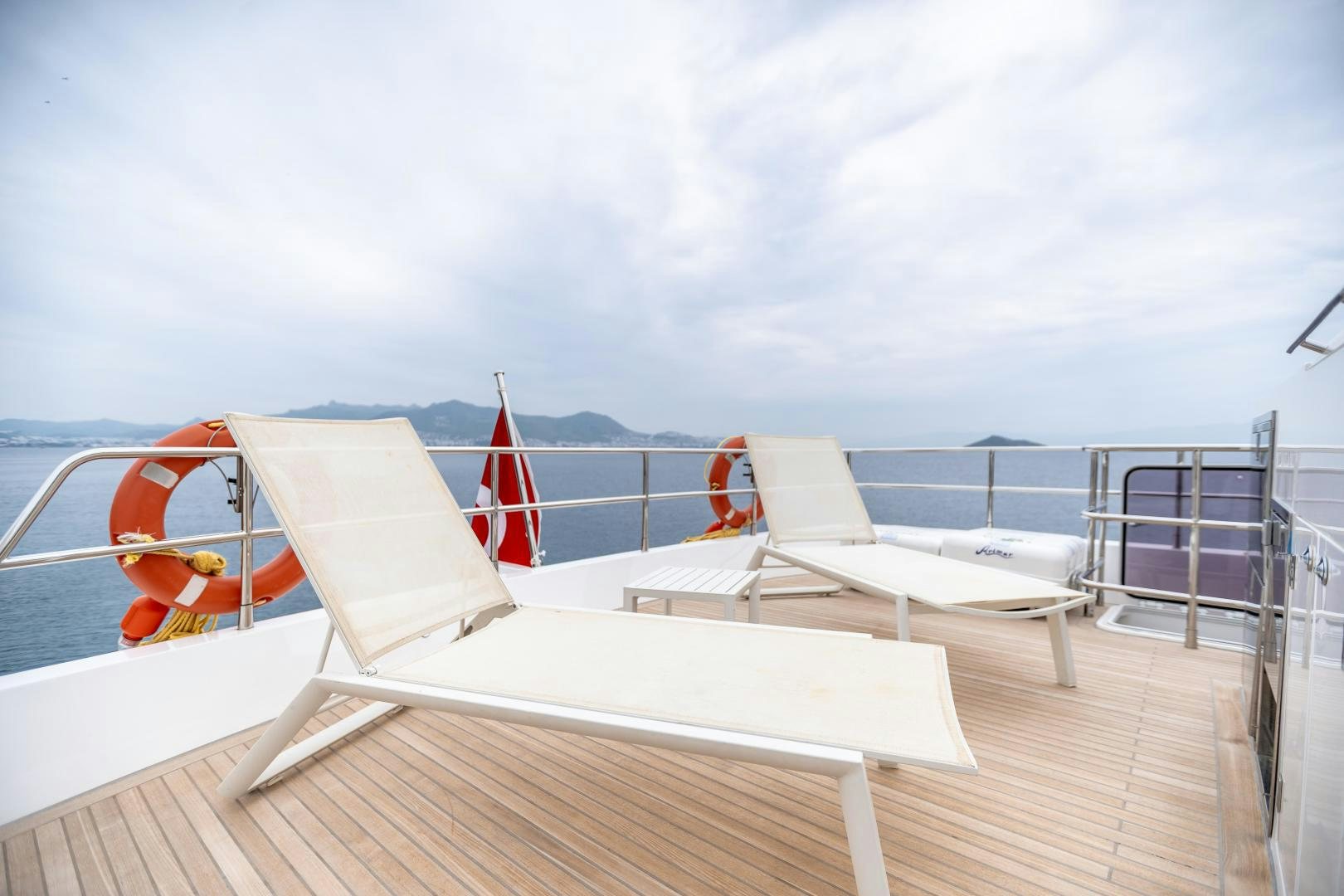 a boat on a deck aboard VICTORY Yacht for Sale