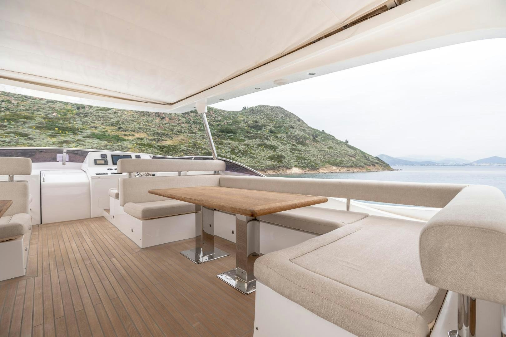 a room with a table and chairs aboard VICTORY Yacht for Sale