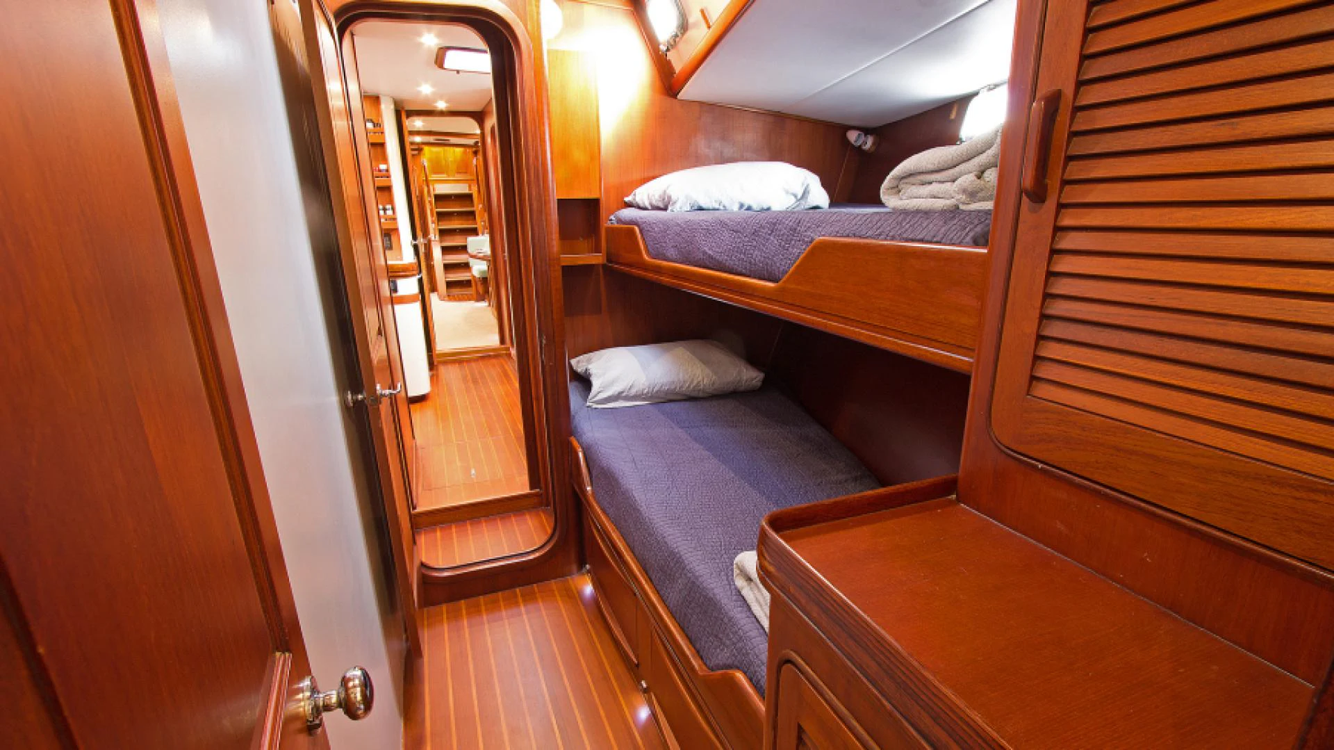 a bed in a room aboard EAGLE'S NEST Yacht for Sale