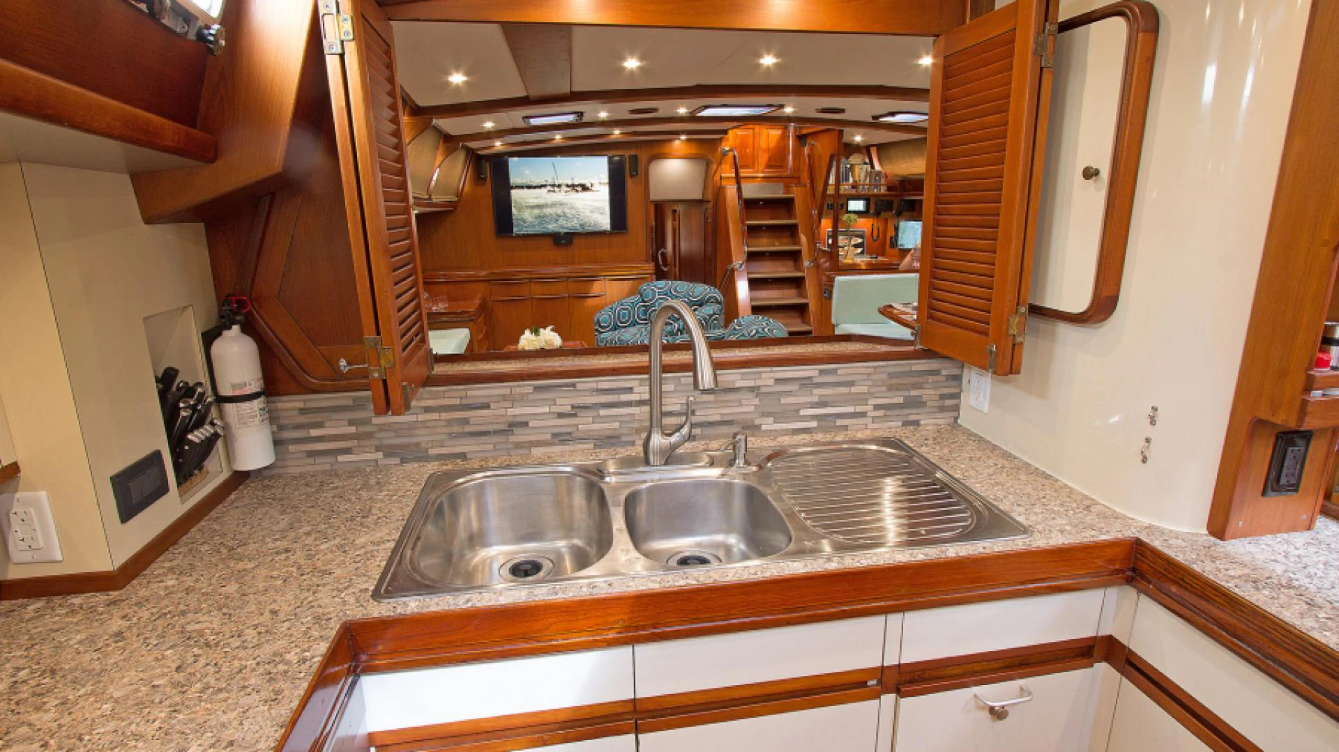 a bathroom with a sink and a mirror aboard EAGLE'S NEST Yacht for Sale