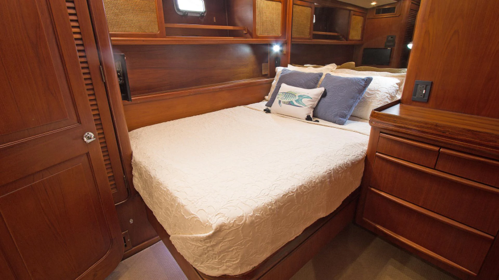 a bed with white sheets aboard EAGLE'S NEST Yacht for Sale