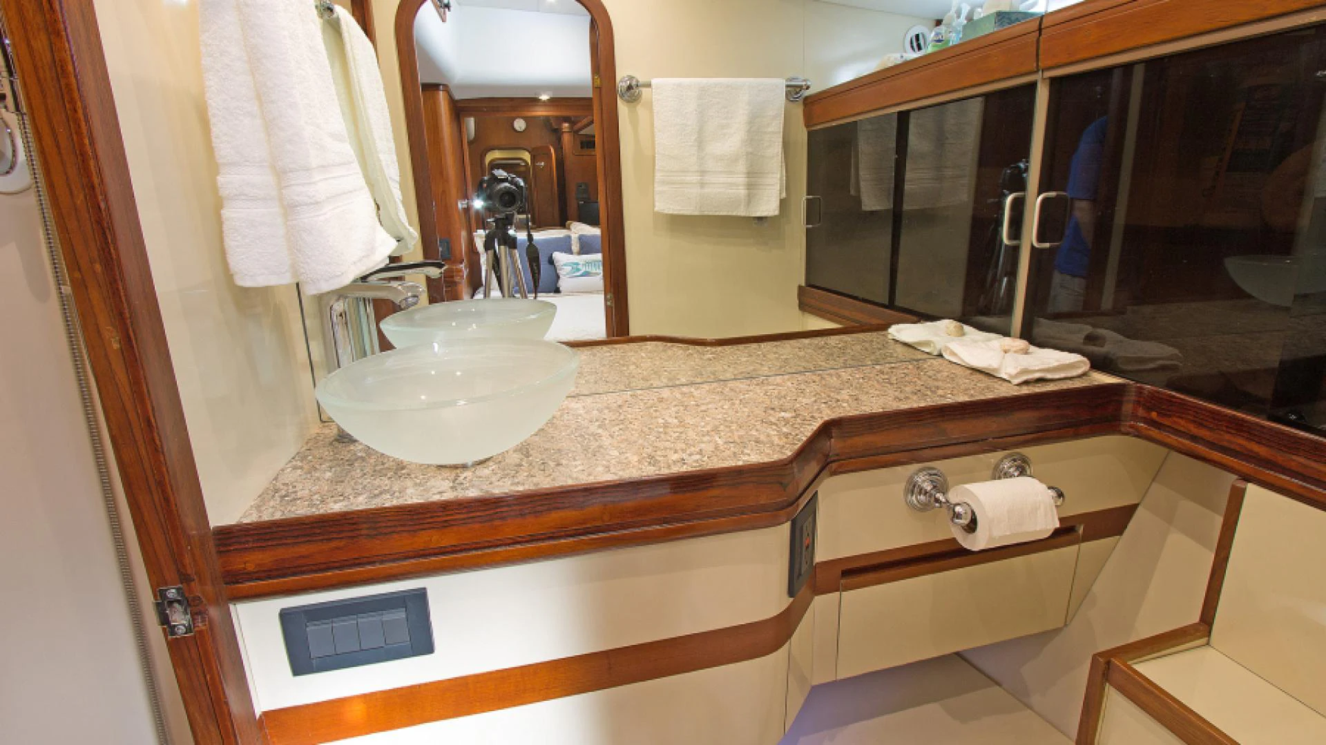 a bathroom with a sink and a mirror aboard EAGLE'S NEST Yacht for Sale