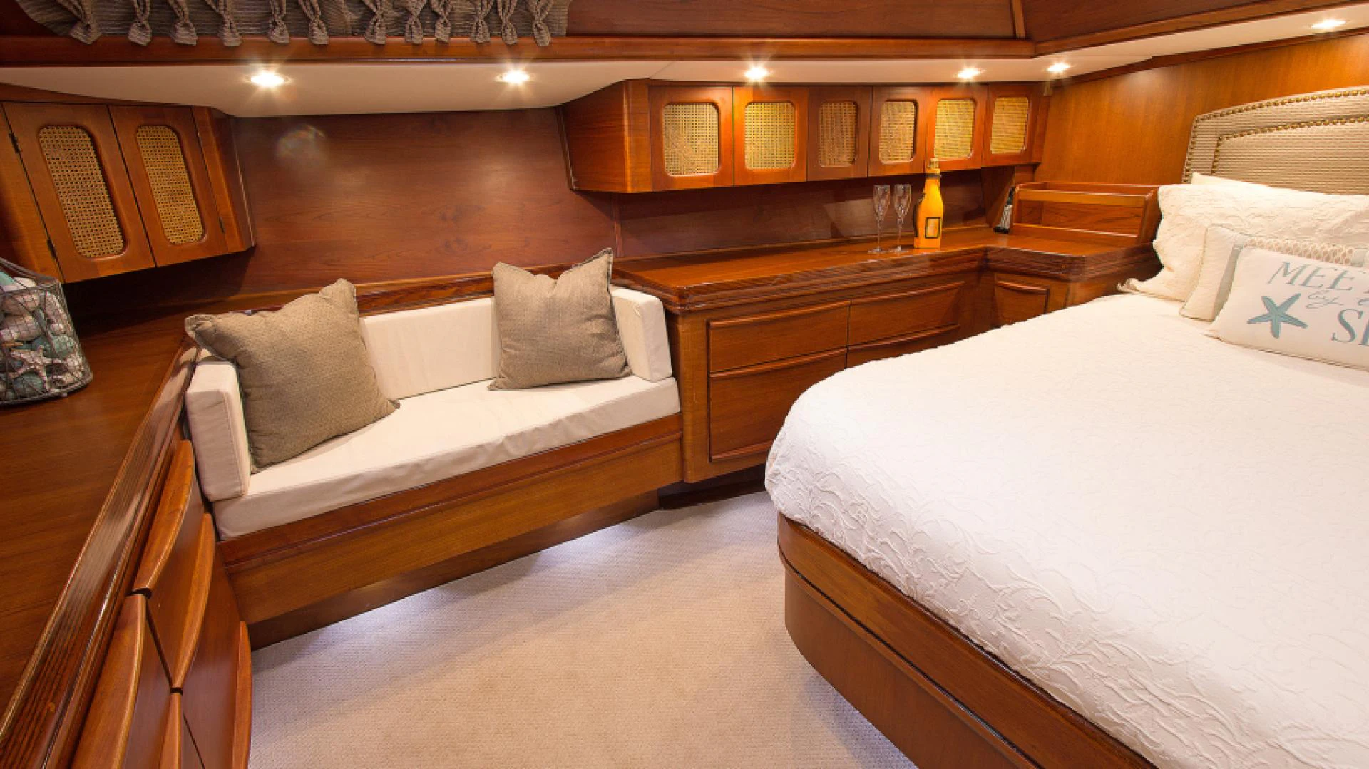 a room with wooden furniture aboard EAGLE'S NEST Yacht for Sale