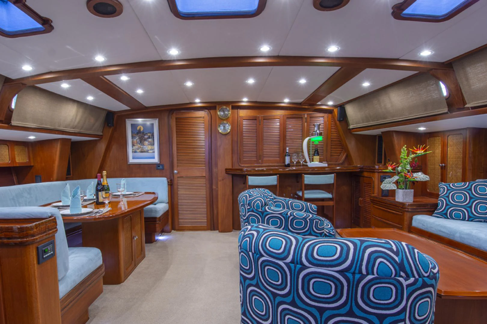 a room with a table and chairs aboard EAGLE'S NEST Yacht for Sale