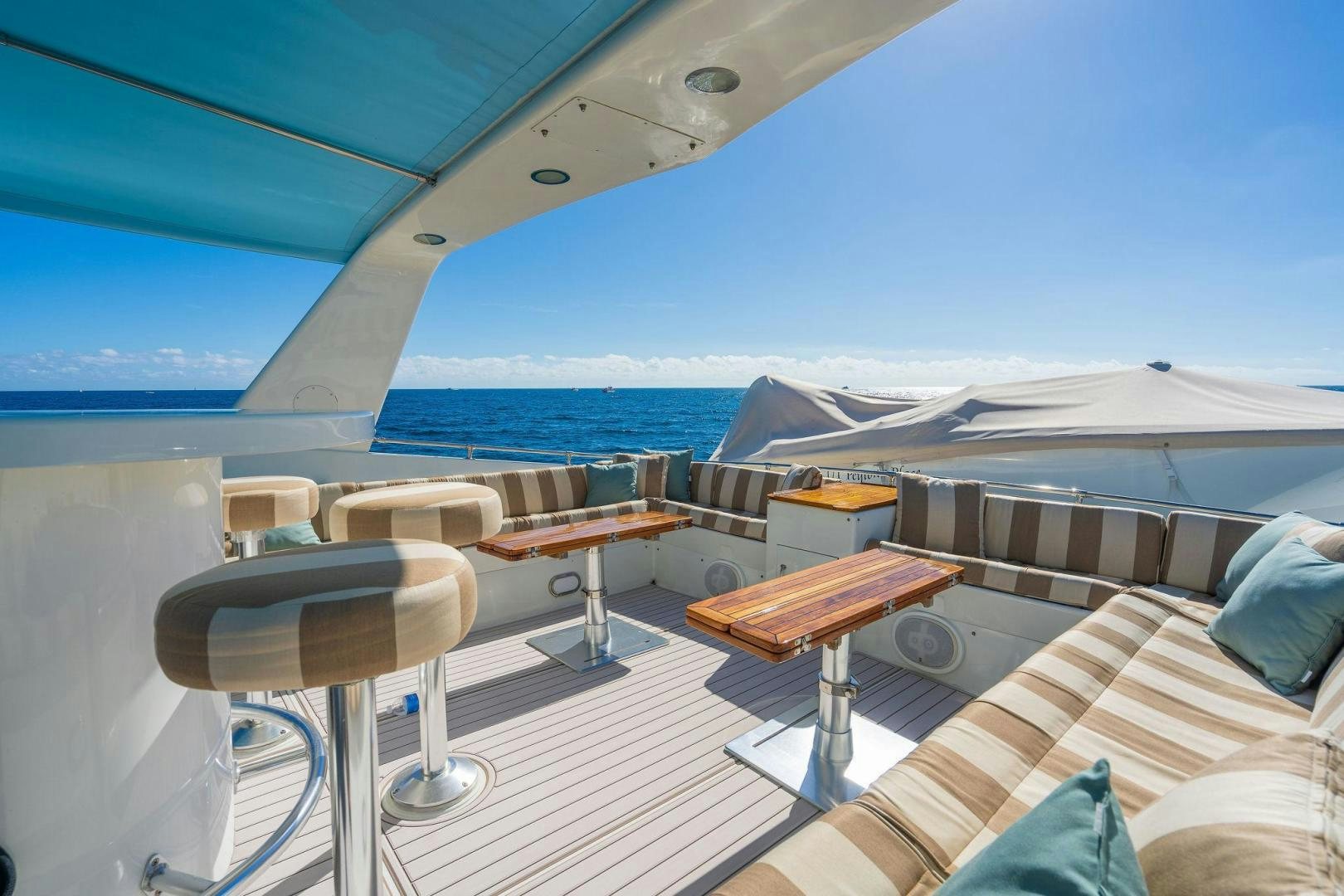 a boat with a view of the water and the land below aboard PEYTONS PLACE Yacht for Sale