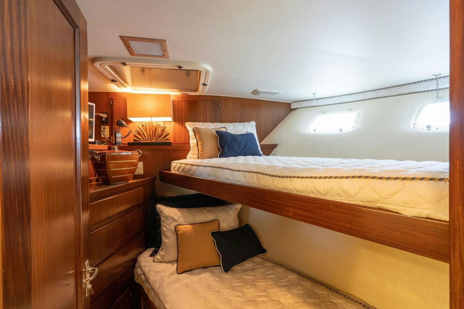 a room with two beds aboard PEYTONS PLACE Yacht for Sale