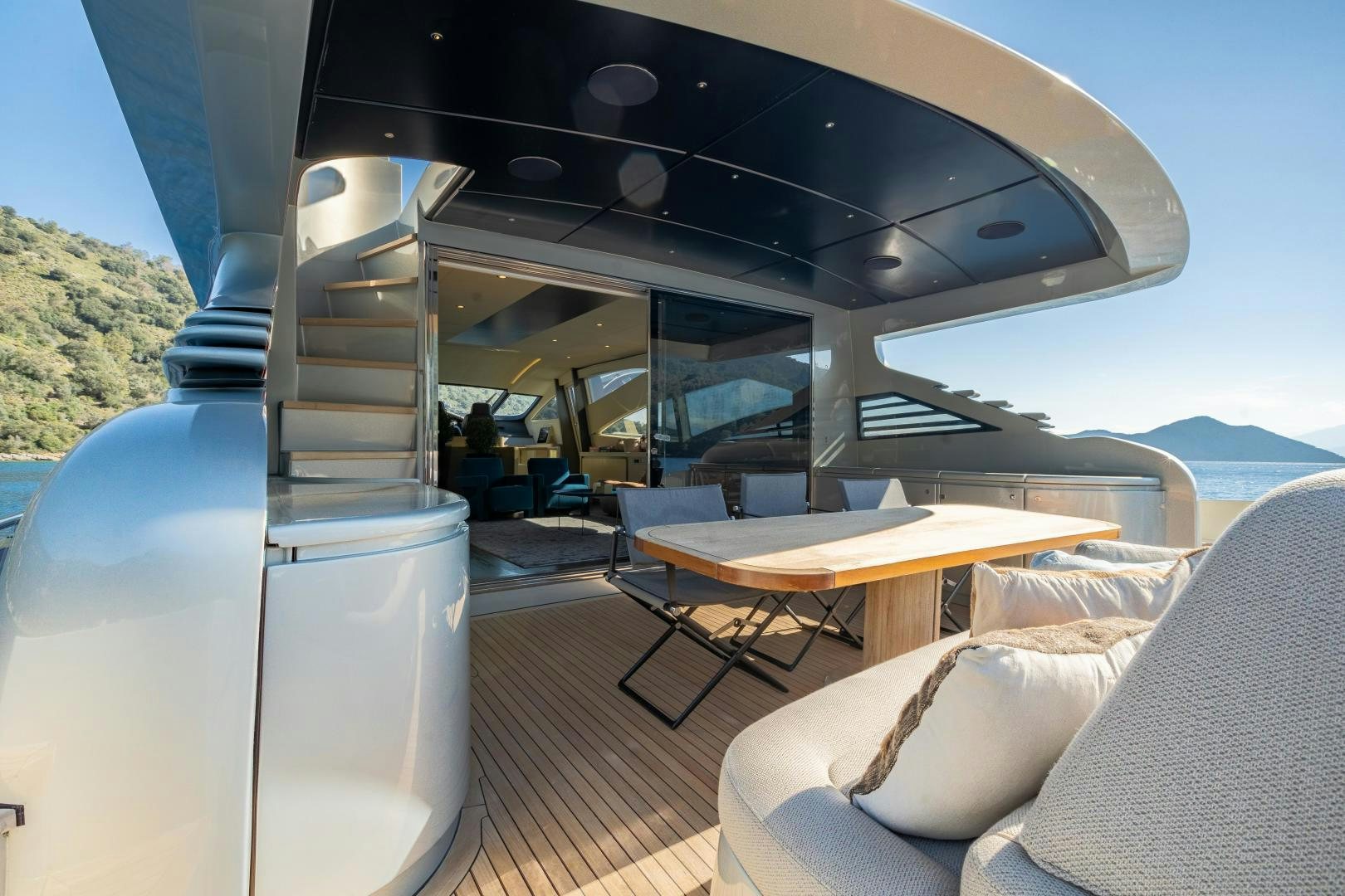 a boat with a table and chairs aboard ALYSSA 1 Yacht for Sale
