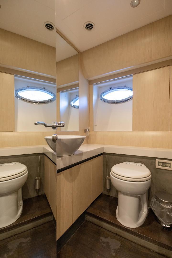 a bathroom with a sink toilet and a bathtub aboard ALYSSA 1 Yacht for Sale