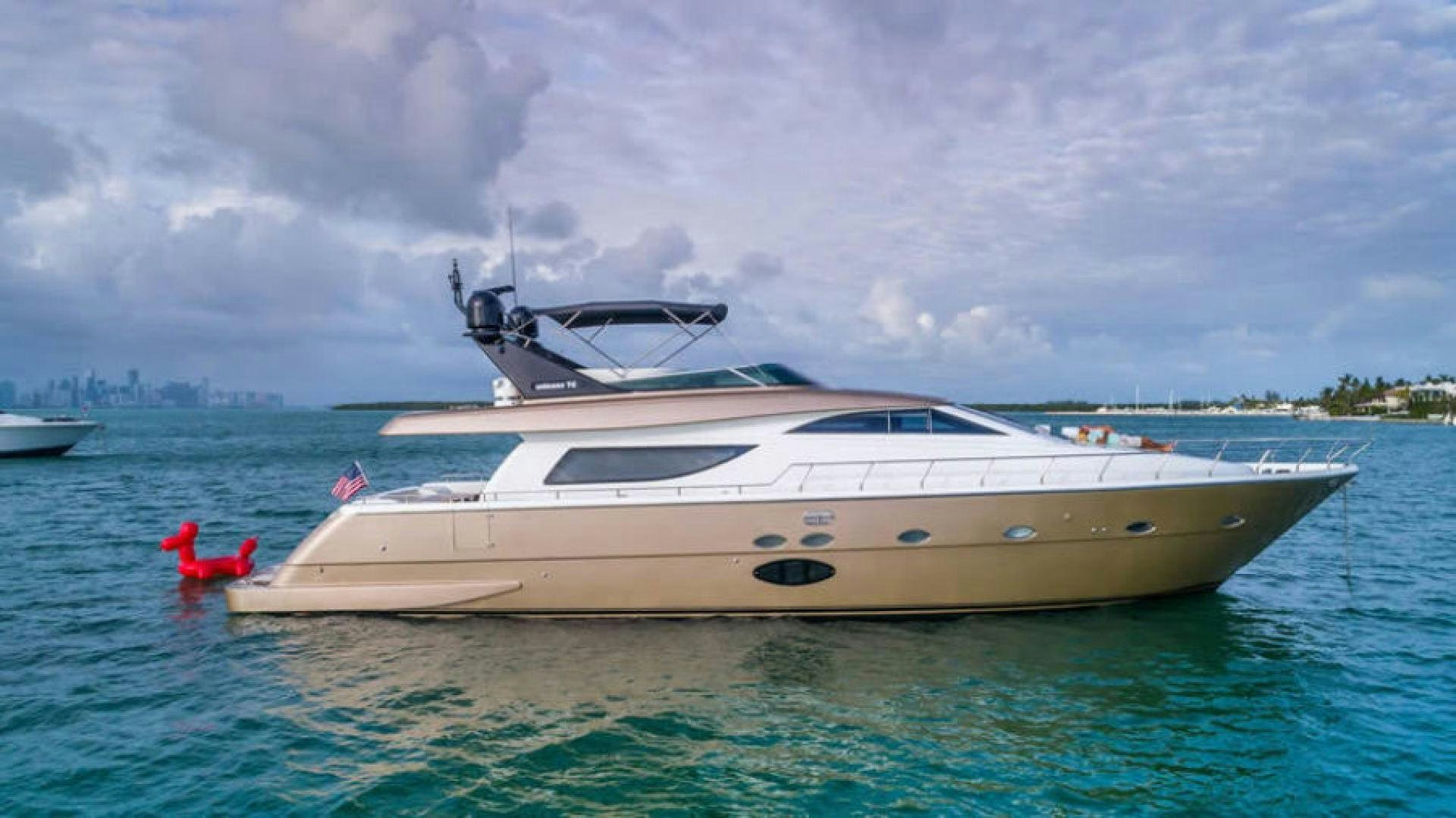 a white yacht in the water aboard NEXT Yacht for Sale