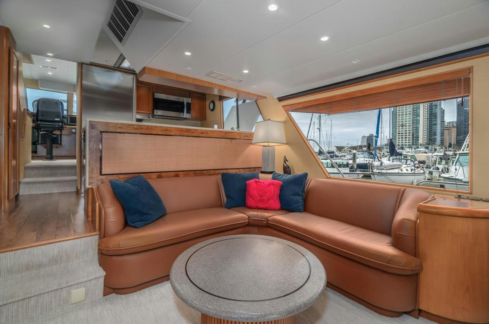 a living room with a large glass window aboard PARAGON Yacht for Sale
