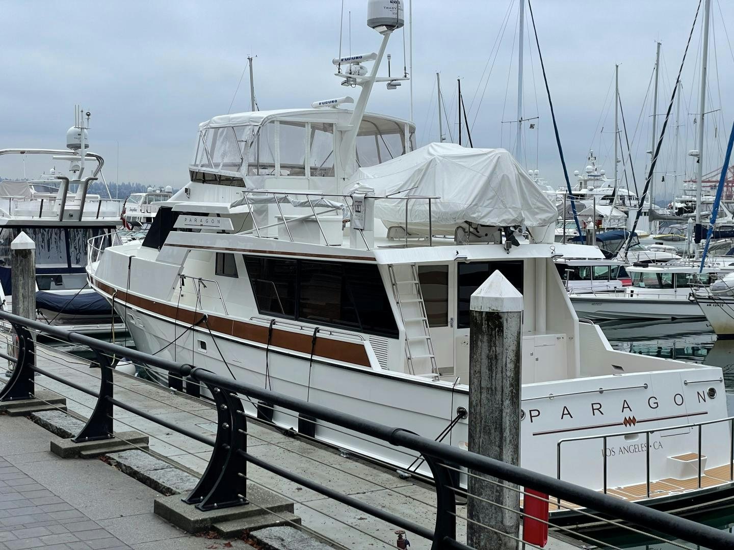 a boat docked at a pier aboard PARAGON Yacht for Sale