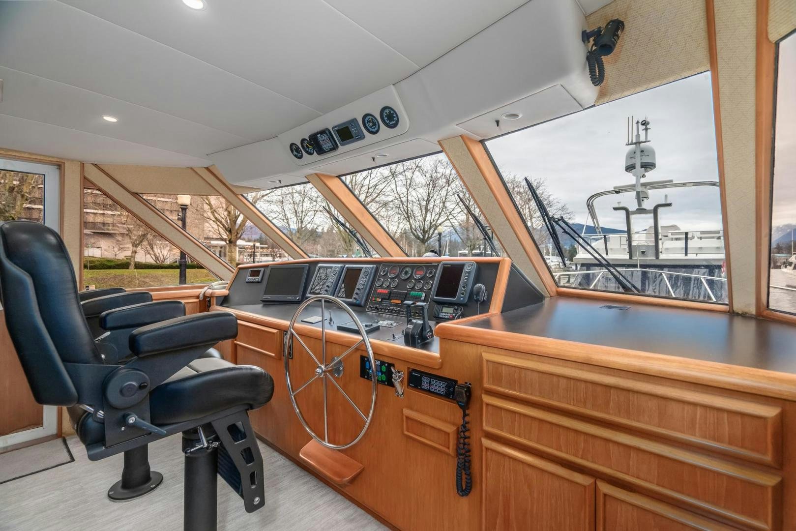 a room with a desk and a chair aboard PARAGON Yacht for Sale