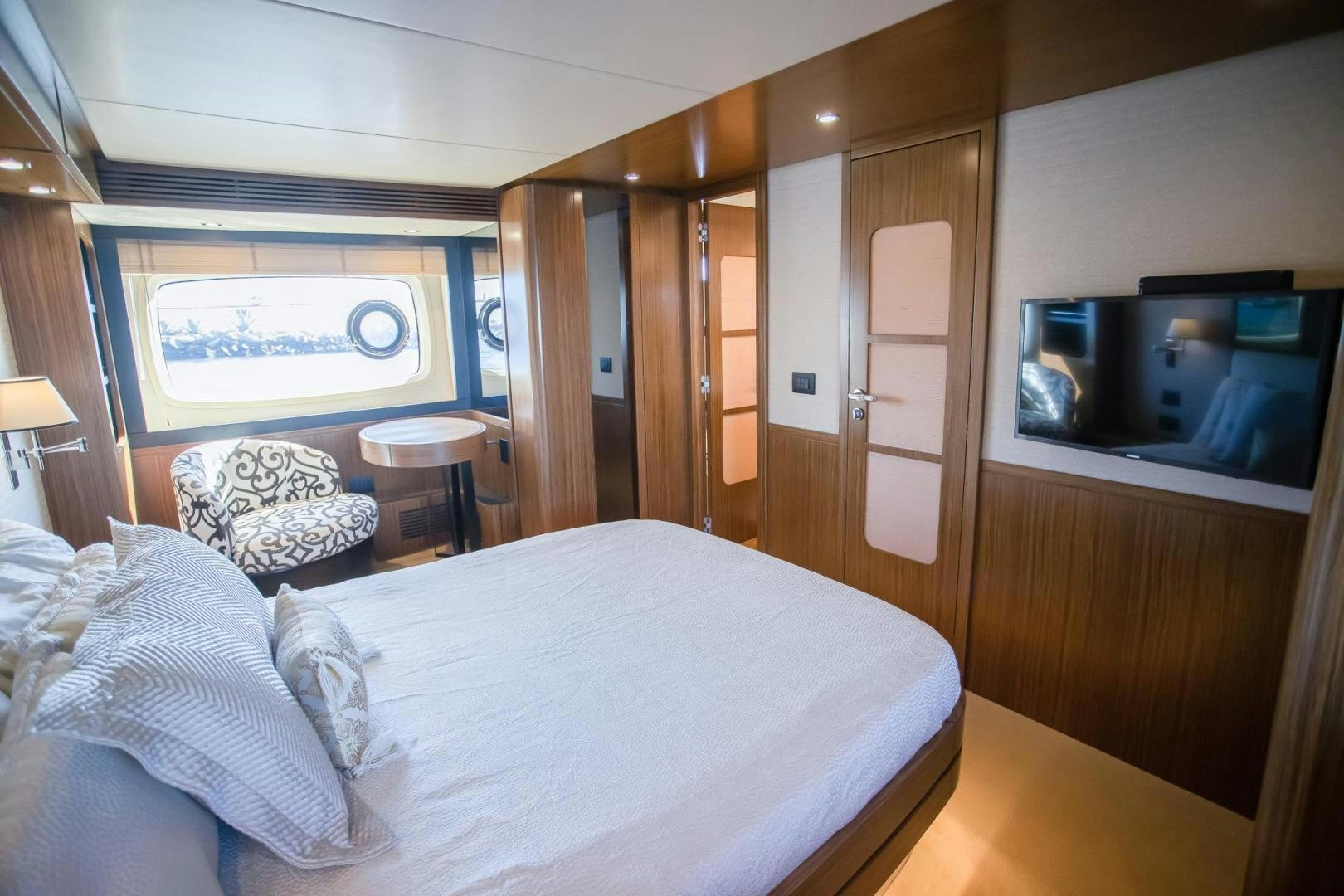 a bed in a room aboard ROY Yacht for Sale