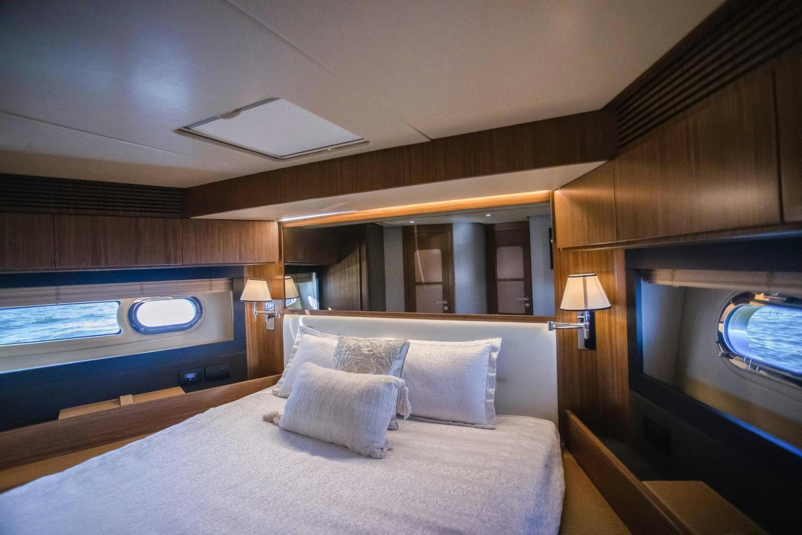 a bed with a large bed aboard ROY Yacht for Sale