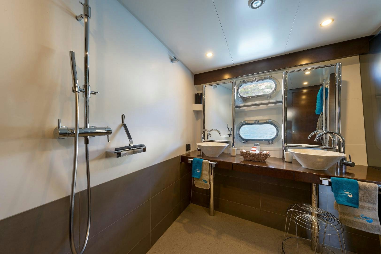 a bathroom with a sink and a mirror aboard MONARA Yacht for Sale