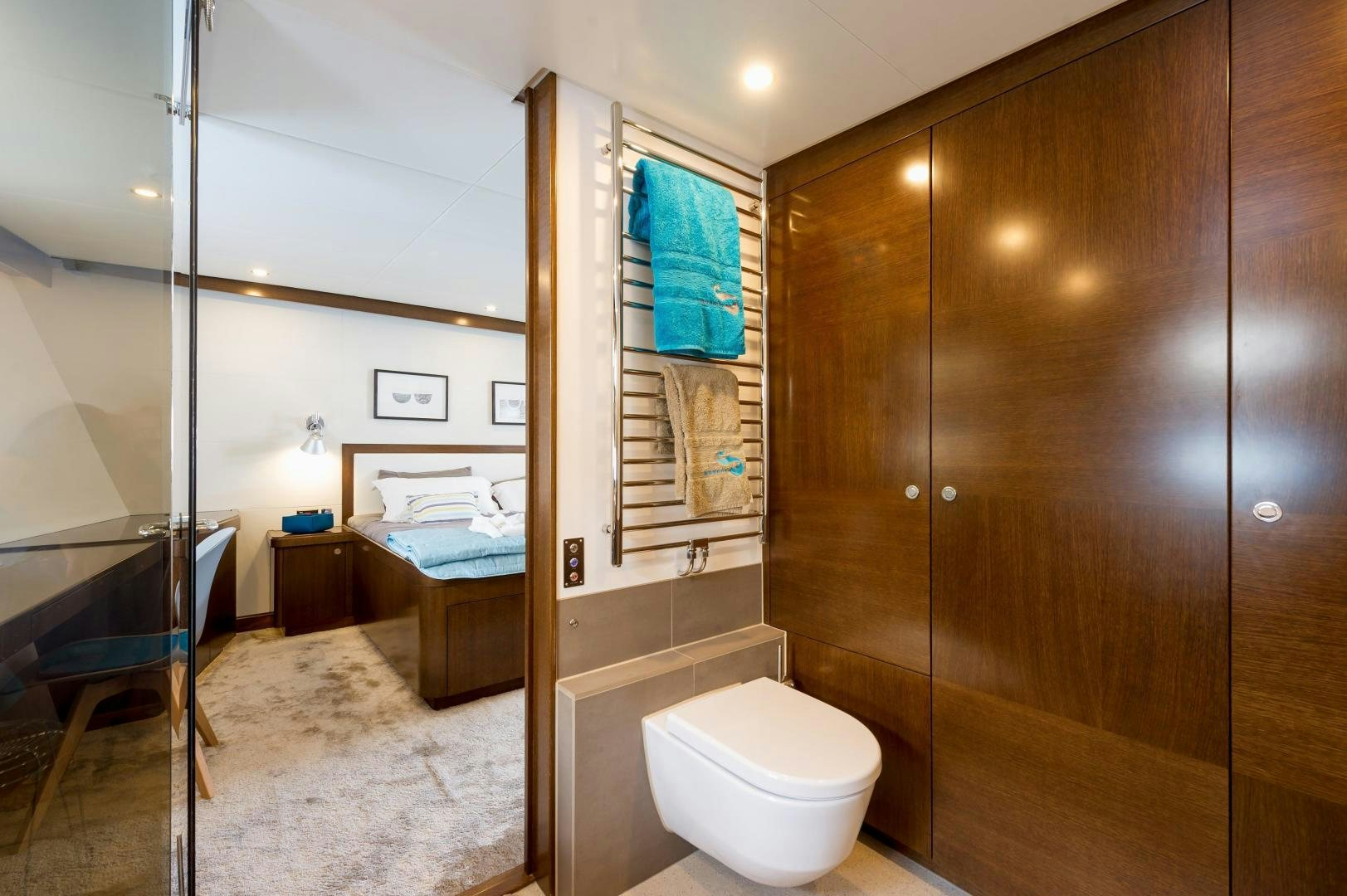 a bathroom with a glass shower aboard MONARA Yacht for Sale