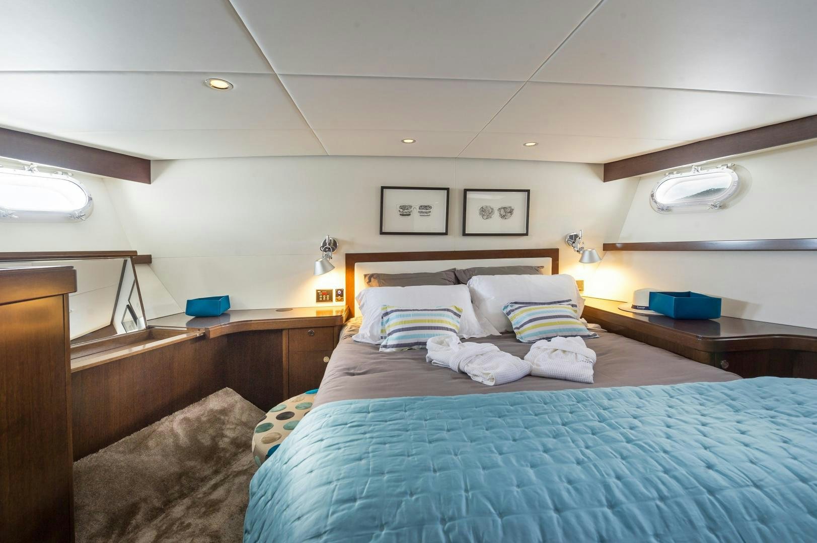 a room with two beds aboard MONARA Yacht for Sale