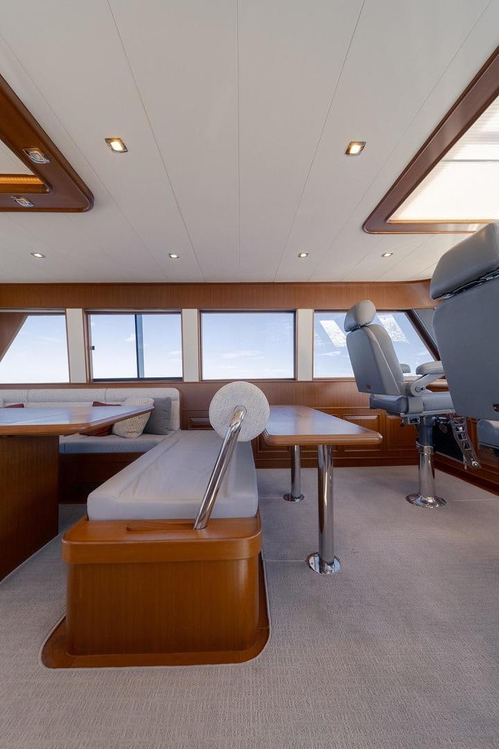 an empty office with a chair and desk aboard PARADISE Yacht for Sale