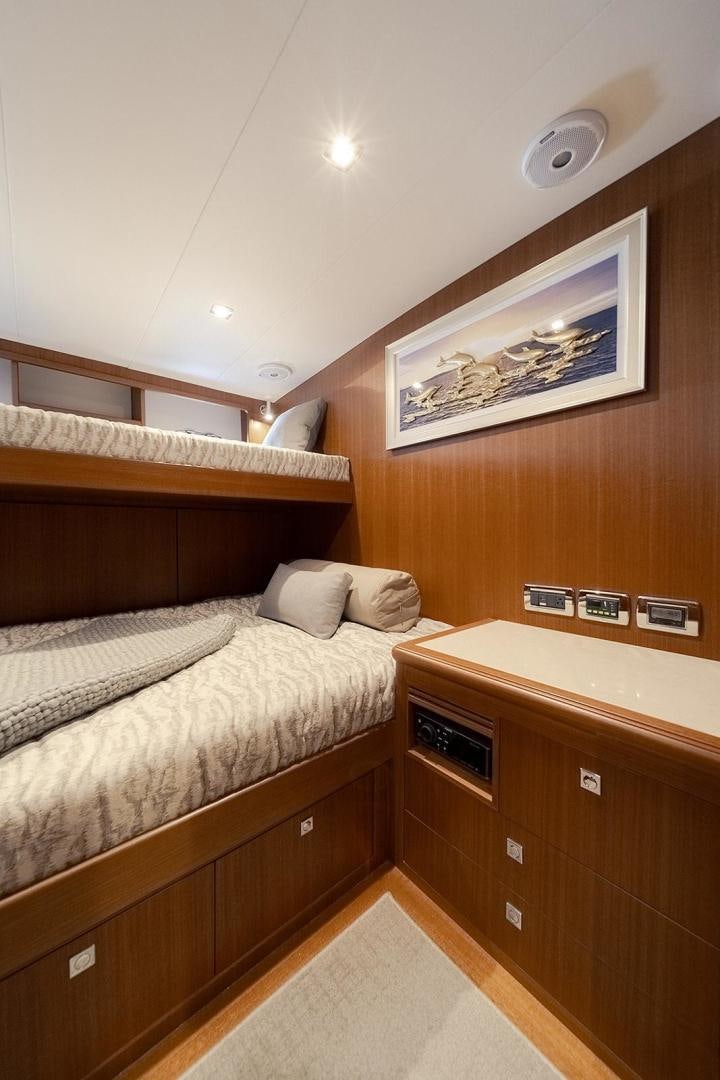 a room with two beds aboard PARADISE Yacht for Sale