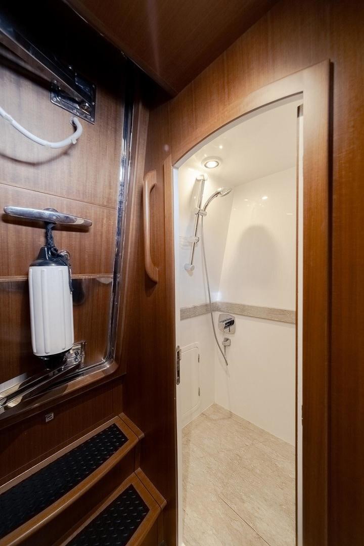 a bathroom with a shower and a sink aboard PARADISE Yacht for Sale