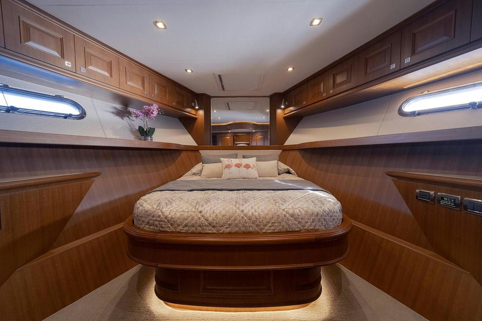 a large bedroom with a large bed aboard PARADISE Yacht for Sale