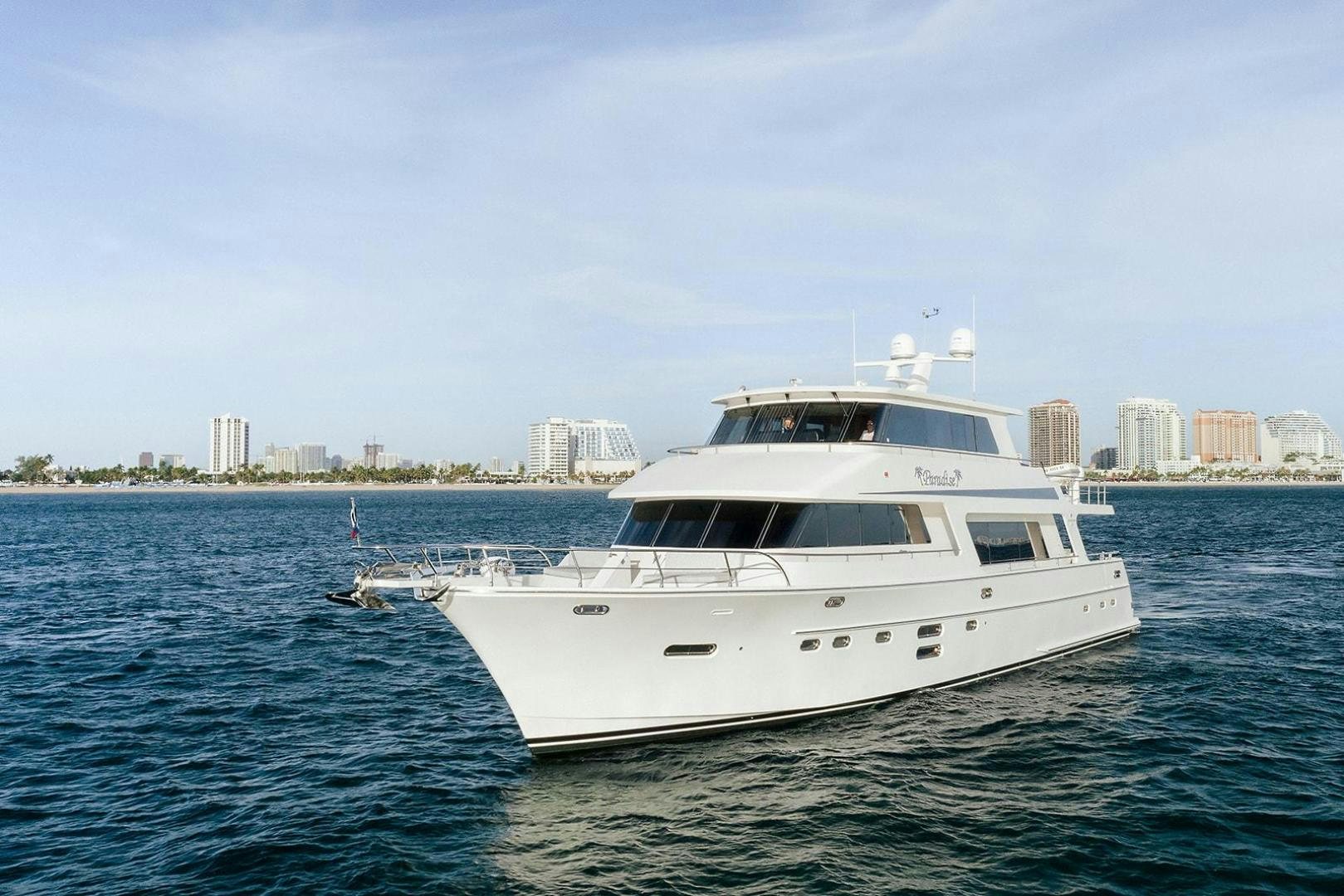 a white yacht in the water aboard PARADISE Yacht for Sale