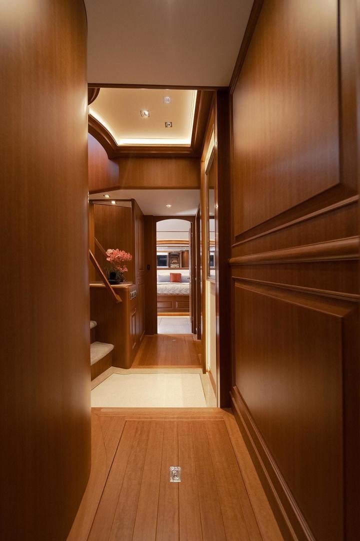 a hallway with a wood floor and a wood floor aboard PARADISE Yacht for Sale