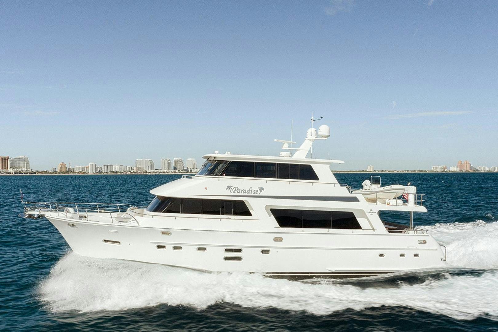 a white yacht on the water aboard PARADISE Yacht for Sale