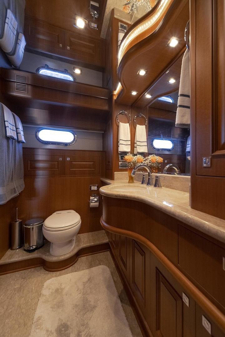 a bathroom with a large mirror aboard PARADISE Yacht for Sale