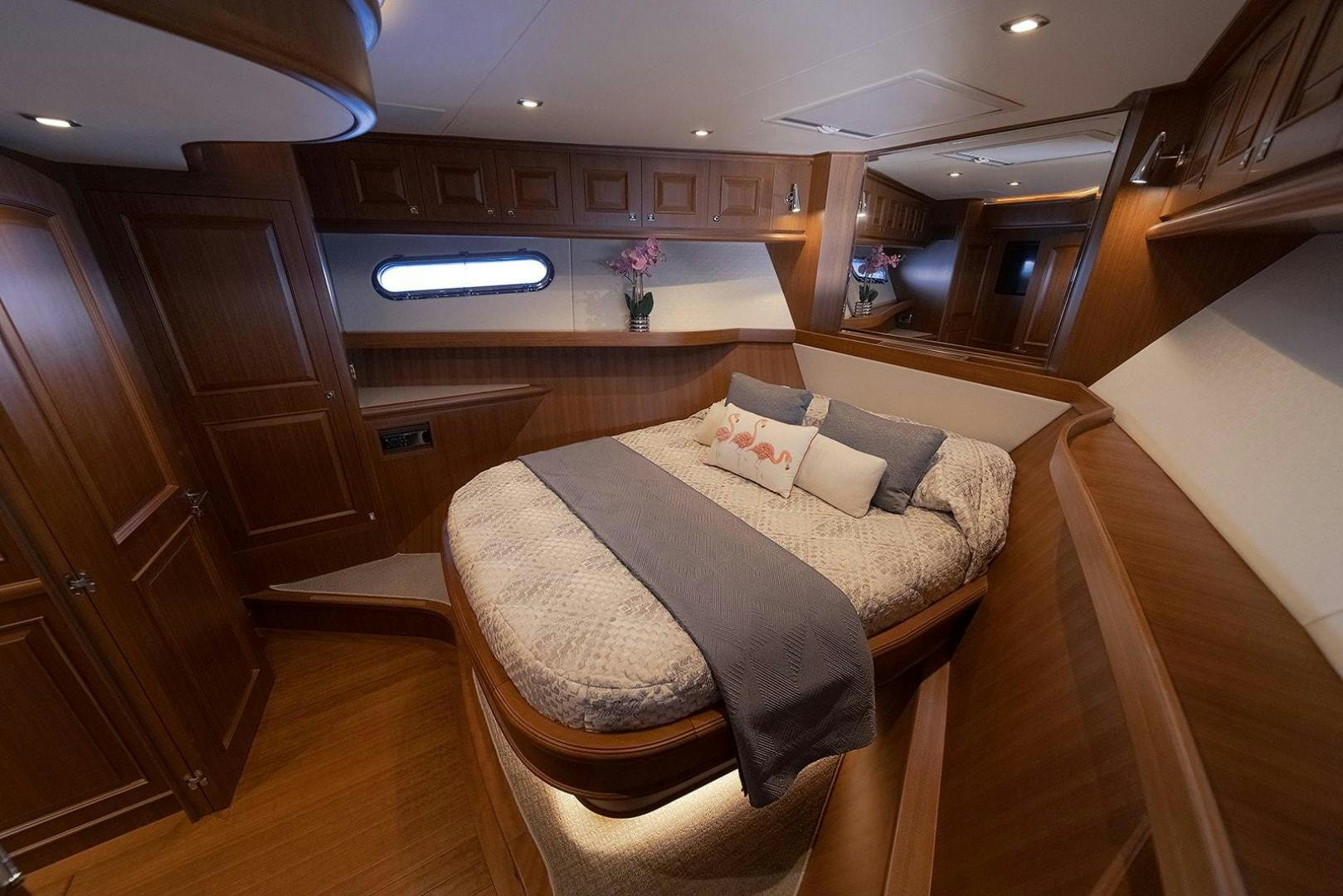 a bedroom with a bed aboard PARADISE Yacht for Sale