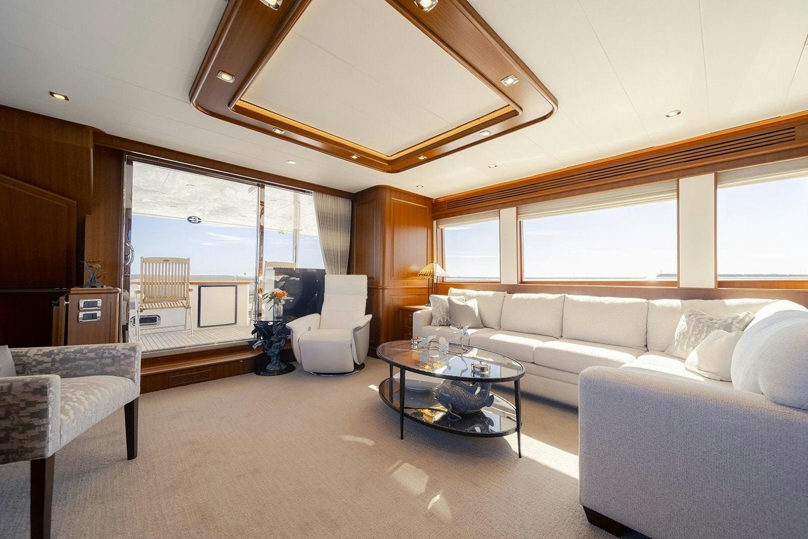 a living room with a large ceiling aboard PARADISE Yacht for Sale