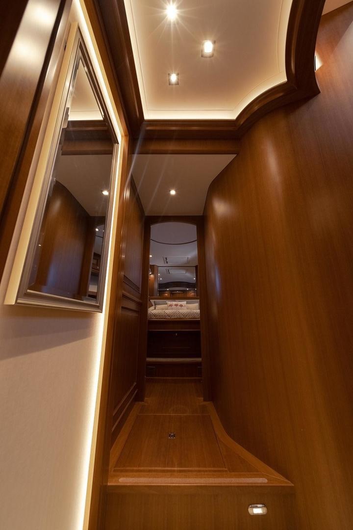 a hallway with a wood floor aboard PARADISE Yacht for Sale