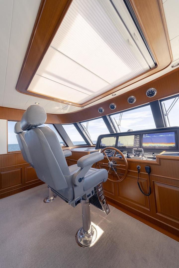 a car with a steering wheel aboard PARADISE Yacht for Sale